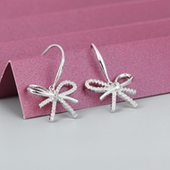 Show details for Delicate White Dangle Earrings of Original Design Show details for Delicate White Dangle Earrings of Original Design