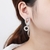 Picture of Copper or Brass White Dangle Earrings for Female