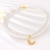 Picture of Beautiful Artificial Pearl Gold Plated Short Chain Necklace