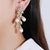 Picture of Unusual Big White Dangle Earrings