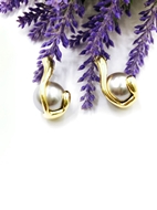 Show details for Sparkly Party shell pearl Clip On Earrings Show details for Sparkly Party shell pearl Clip On Earrings